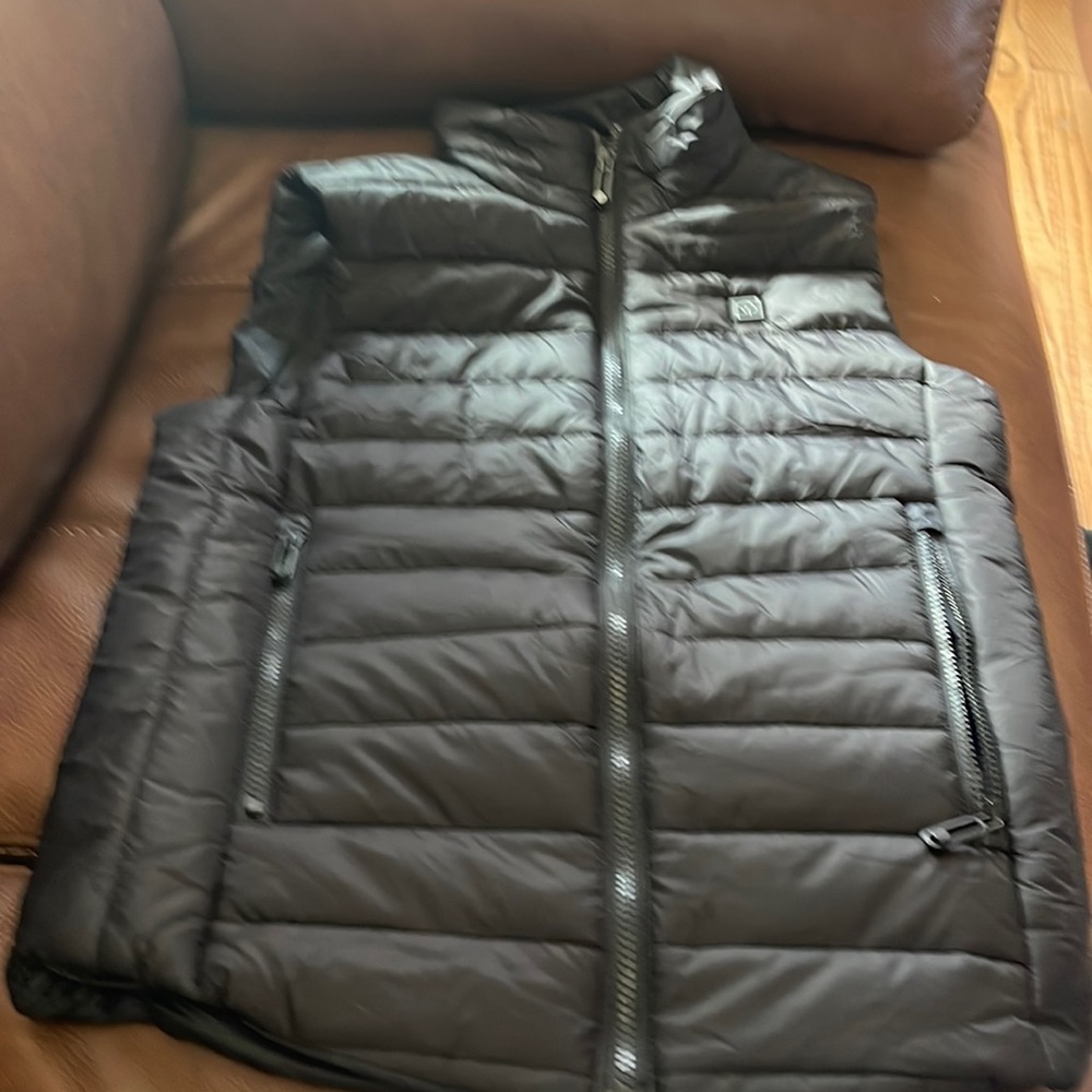 New black vest size small